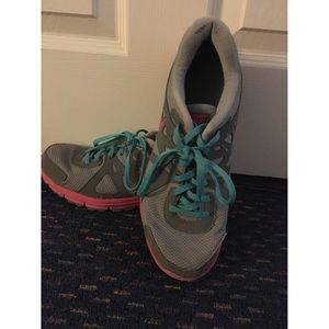 Blue and pink Nikes